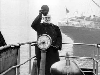 1901 - A captain waves aboard the Skirmisher in 1901 with the Lucania